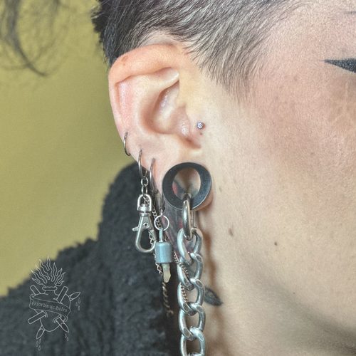 Jordan Dzialoski children's ear piercing work