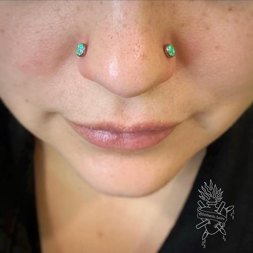 Jordan Dzialoski children's ear piercing work