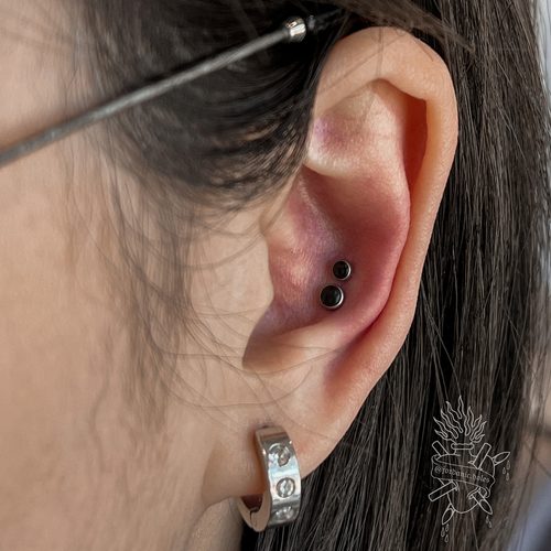 Jordan Dzialoski children's ear piercing work