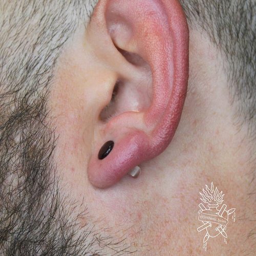 Jordan Dzialoski children's ear piercing work