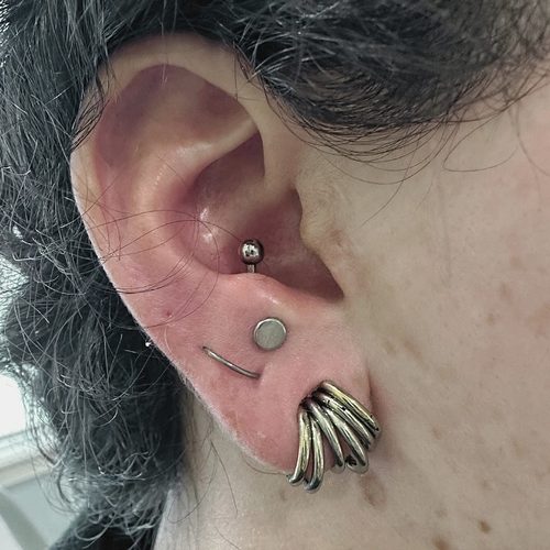 Jordan Dzialoski children's ear piercing work