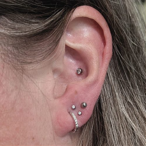 Jordan Dzialoski children's ear piercing work