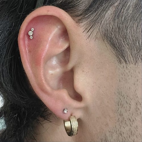 Jordan Dzialoski children's ear piercing work