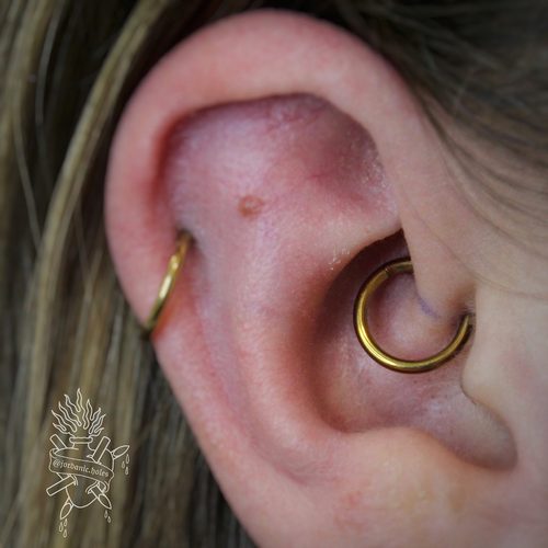 Jordan Dzialoski children's ear piercing work