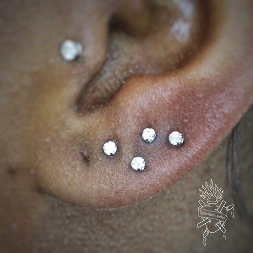 Jordan Dzialoski children's ear piercing work