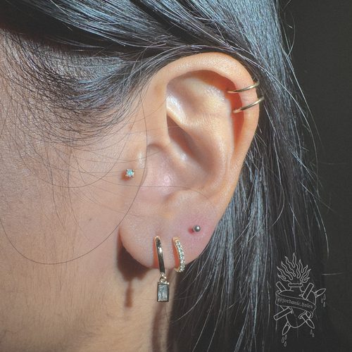 Jordan Dzialoski children's ear piercing work