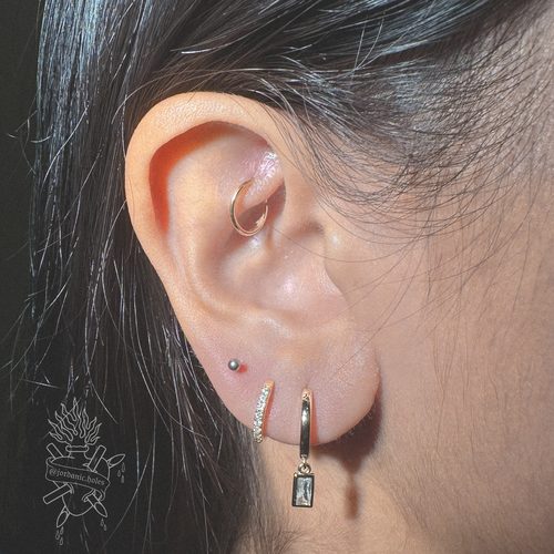 Jordan Dzialoski children's ear piercing work