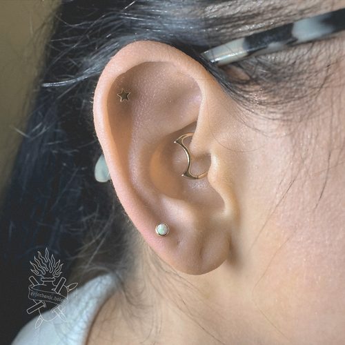Jordan Dzialoski children's ear piercing work