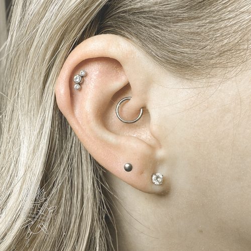 Jordan Dzialoski children's ear piercing work